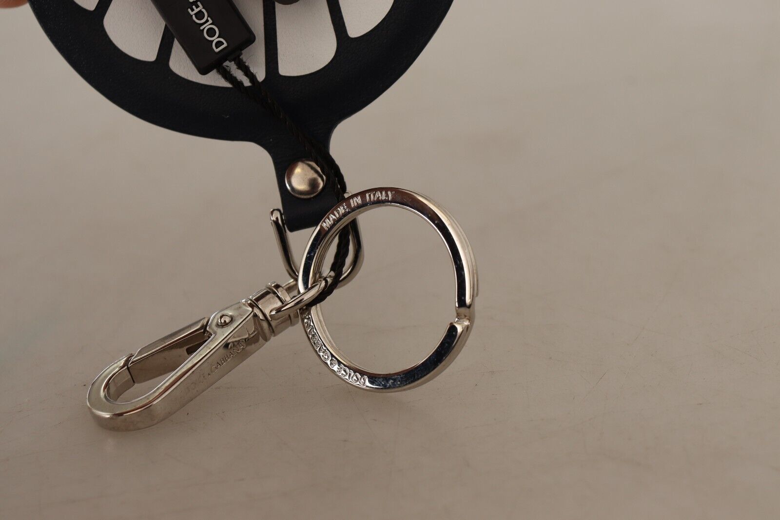 1606572.jpg Chic Black Leather Keychain with Silver Accents - Image 5
