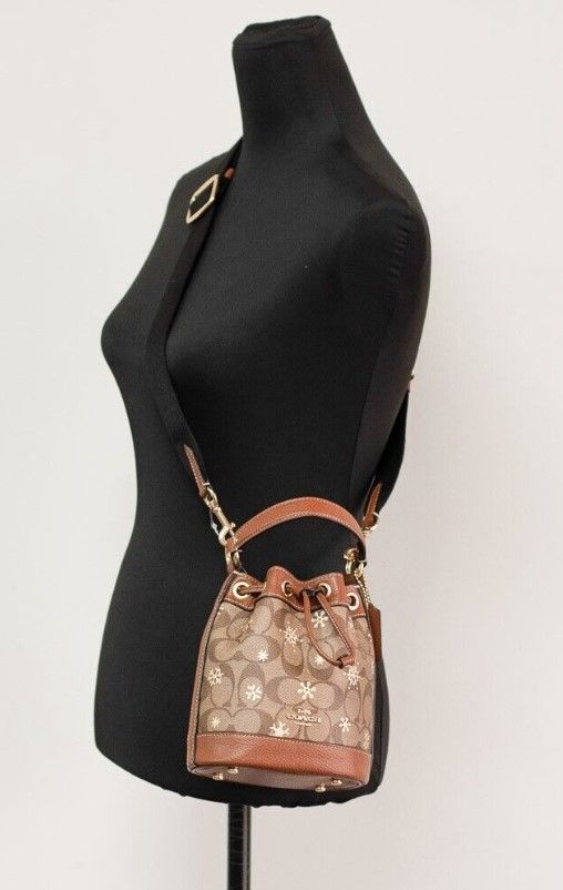 1871752.jpg Dempsey 15 Small Snowflake Print Khaki Coated Canvas Bucket Bag - Image 2