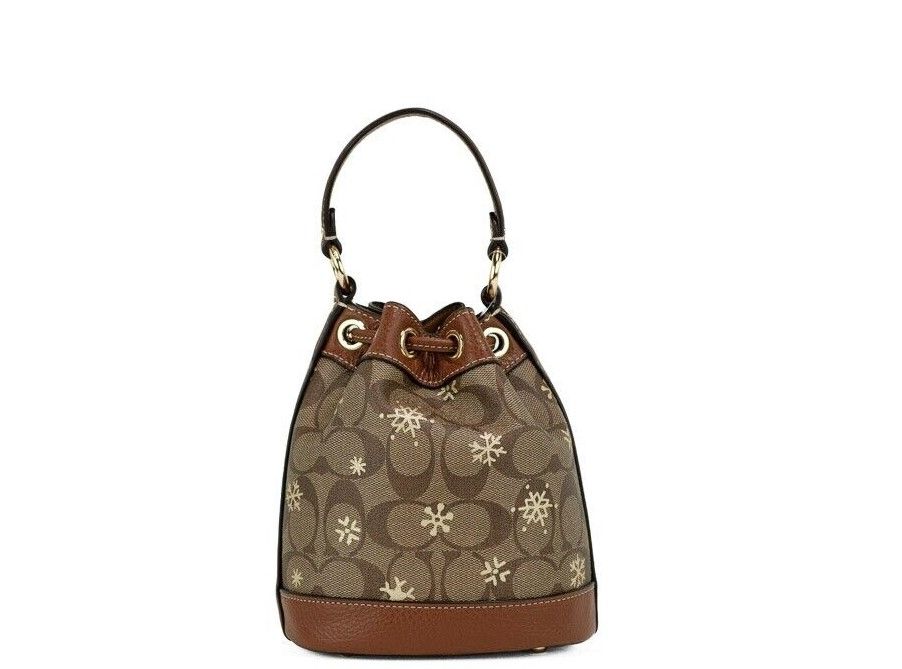 1871753.jpg Dempsey 15 Small Snowflake Print Khaki Coated Canvas Bucket Bag - Image 4