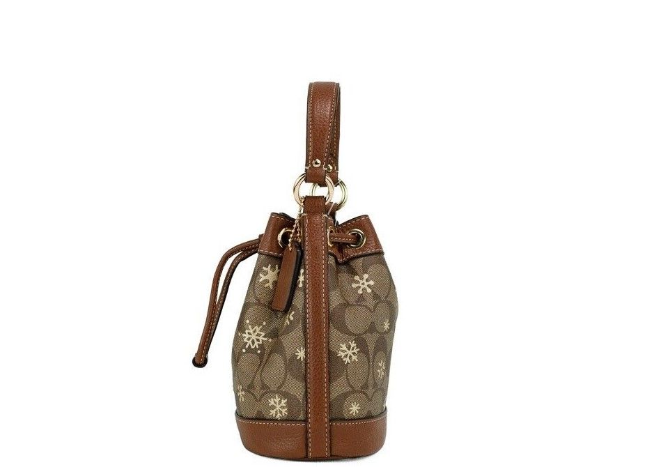 1871754.jpg Dempsey 15 Small Snowflake Print Khaki Coated Canvas Bucket Bag - Image 3