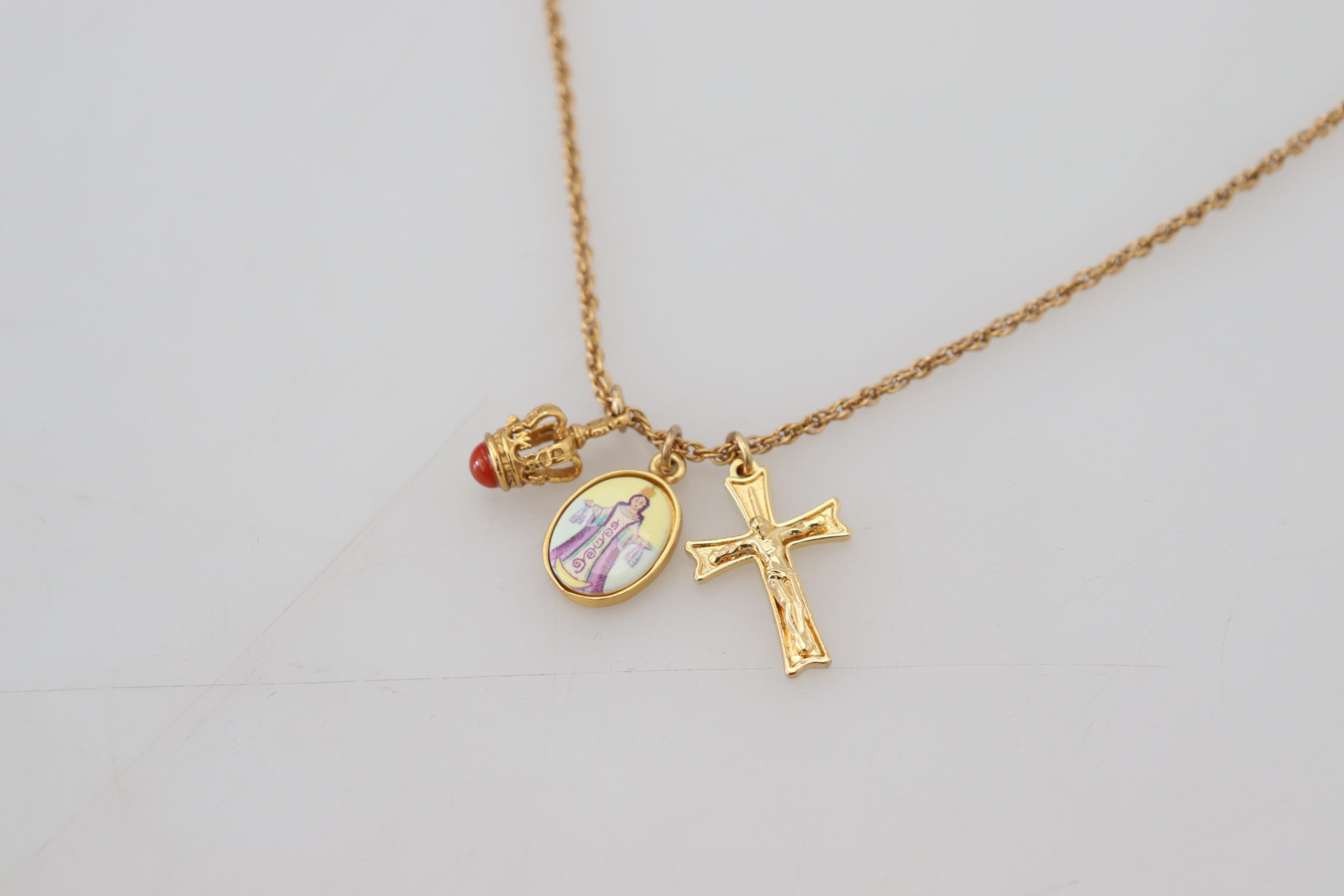 4084897.jpg Elegant Gold Tone Charm Necklace with Cross Pendant - Image 5