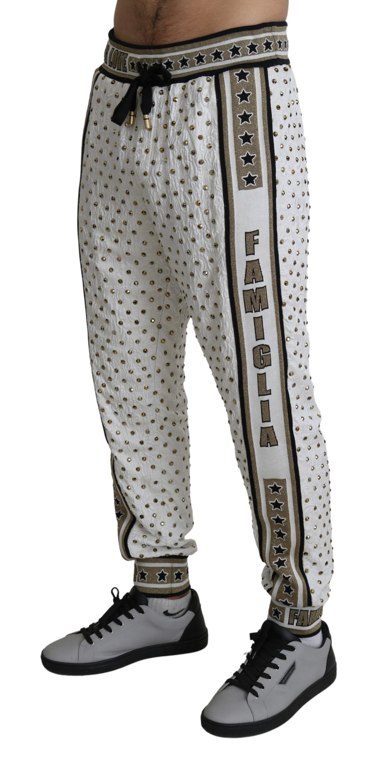 IMG_3625-scaled-4d71f01a-829.jpg Elegant White Sweatpants with Gold Studs - Image 3